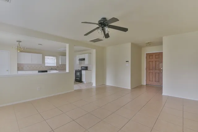 a view of a kitchen with a sink and cabinet area