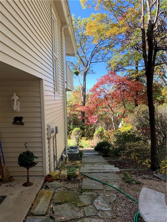 104 Little Falls Drive Tryon, NC 28782 - Photo 4 of 21 a view of a back yard of the house