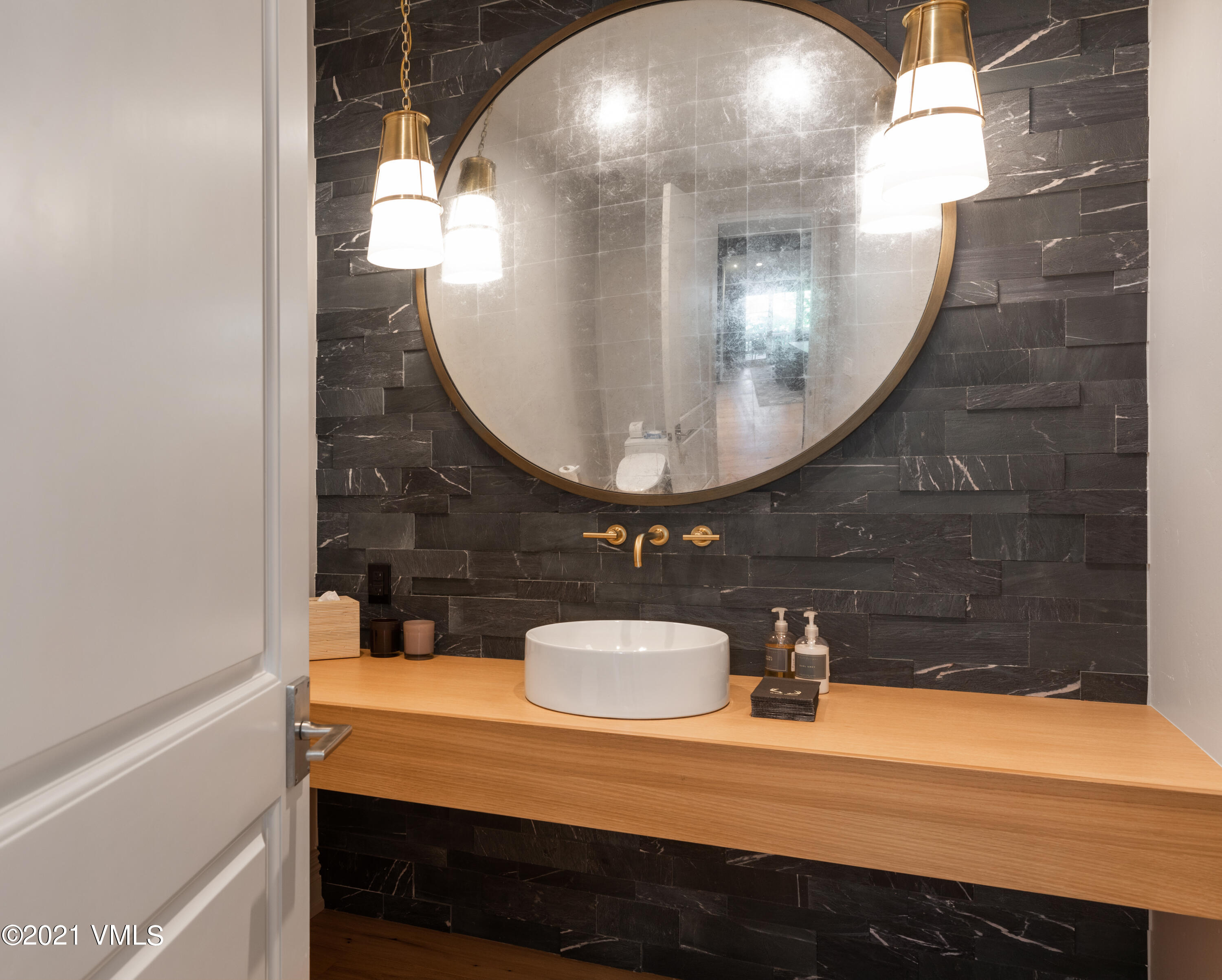 78 Aspen Meadows Road Edwards, CO 81632 - Photo 13 of 16 a bathroom with a sink and a mirror