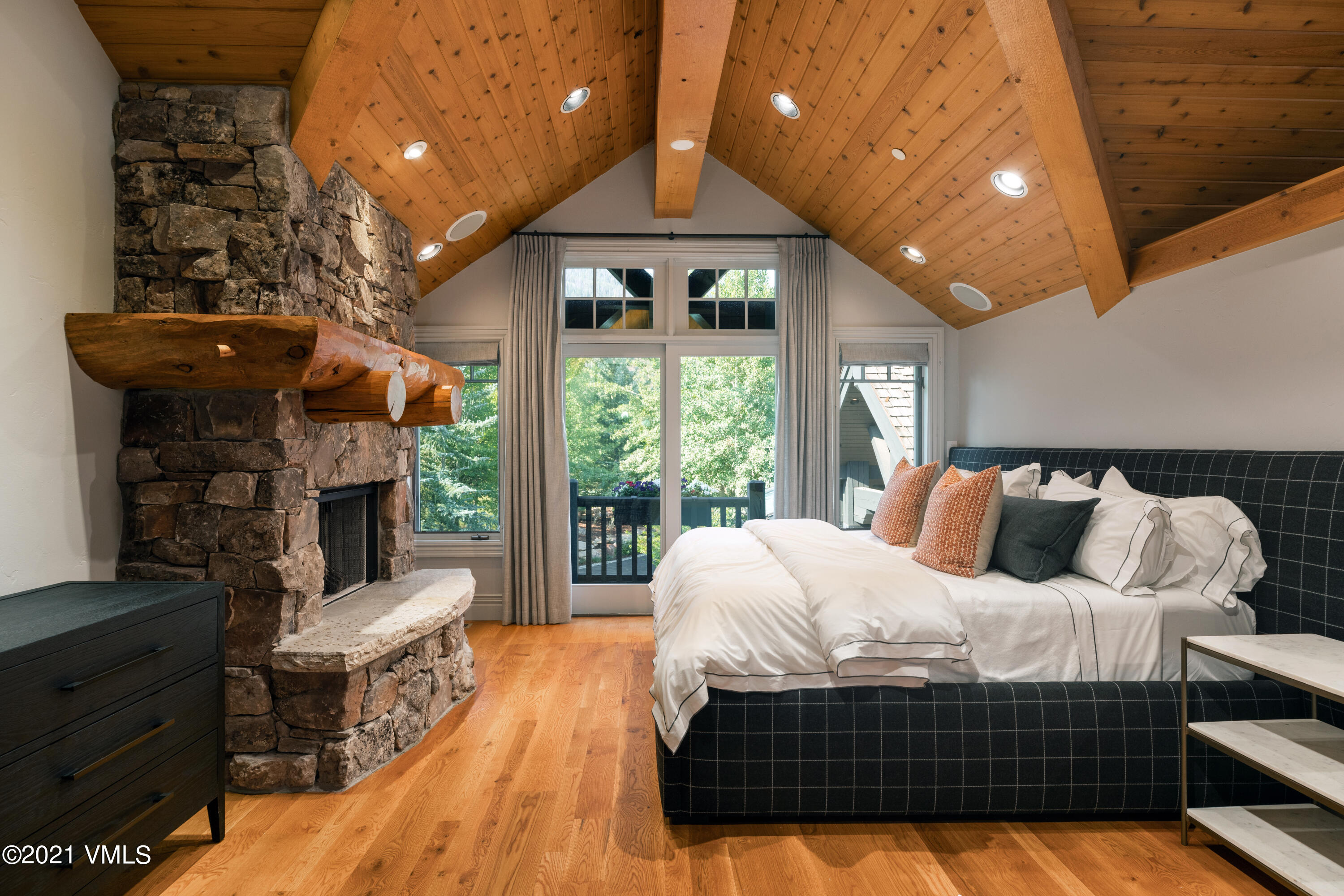78 Aspen Meadows Road Edwards, CO 81632 - Photo 6 of 16 a bedroom with furniture and a large window