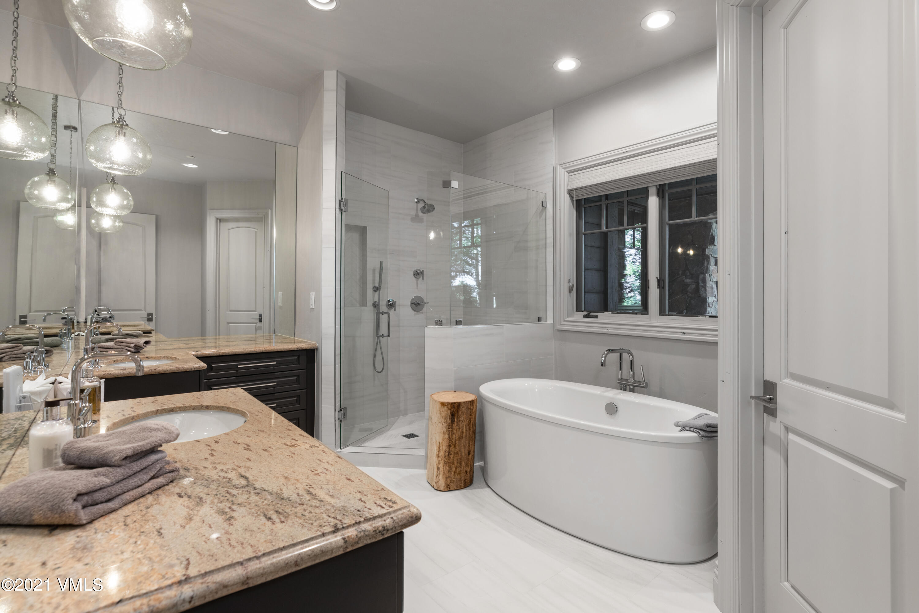 78 Aspen Meadows Road Edwards, CO 81632 - Photo 10 of 16 a bathroom with a granite countertop sink a toilet and bathtub
