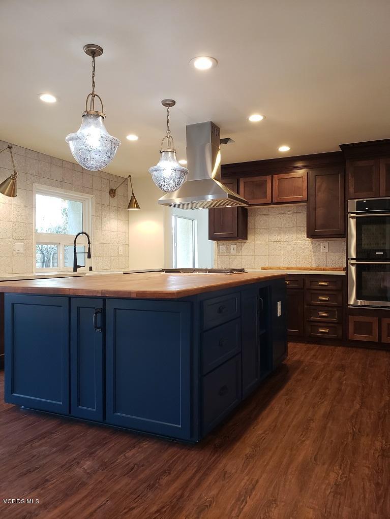 392 Tranquil Lane Oak Park, CA 91377 - Photo 11 of 31 kitchen island