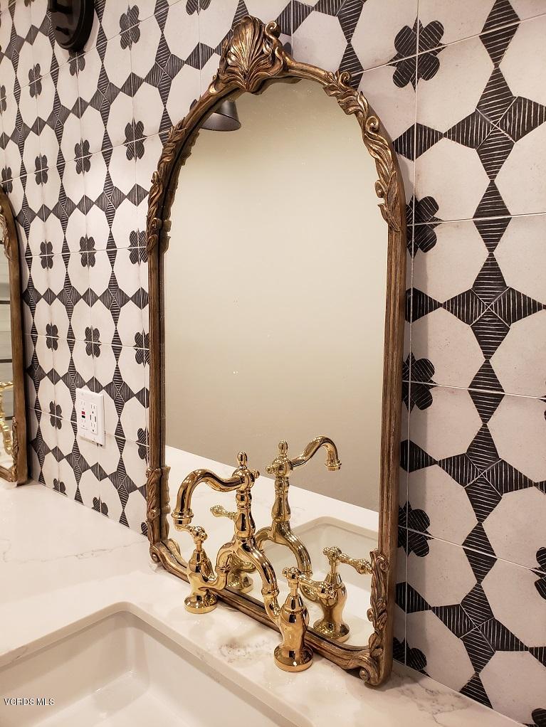 392 Tranquil Lane Oak Park, CA 91377 - Photo 16 of 31 1st floor bath mirror