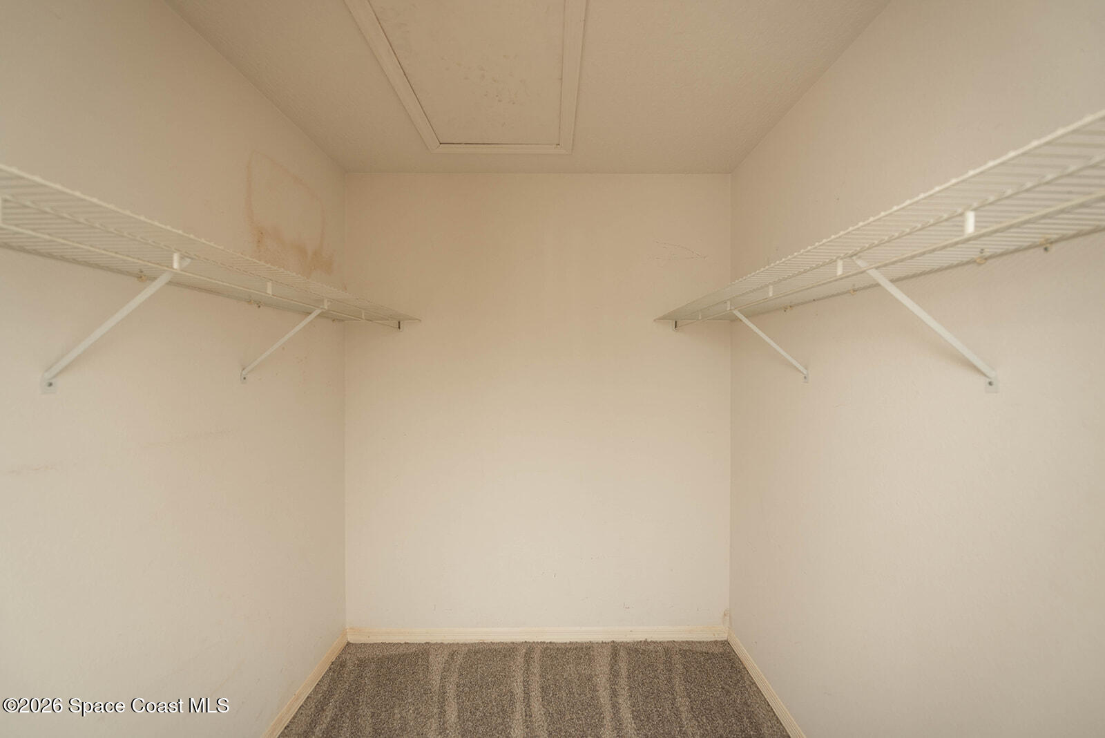 1954 Quail Ridge Court, Unit 1701 Cocoa, FL 32926 - Photo 15 of 41 a view of small space with racks on the wall