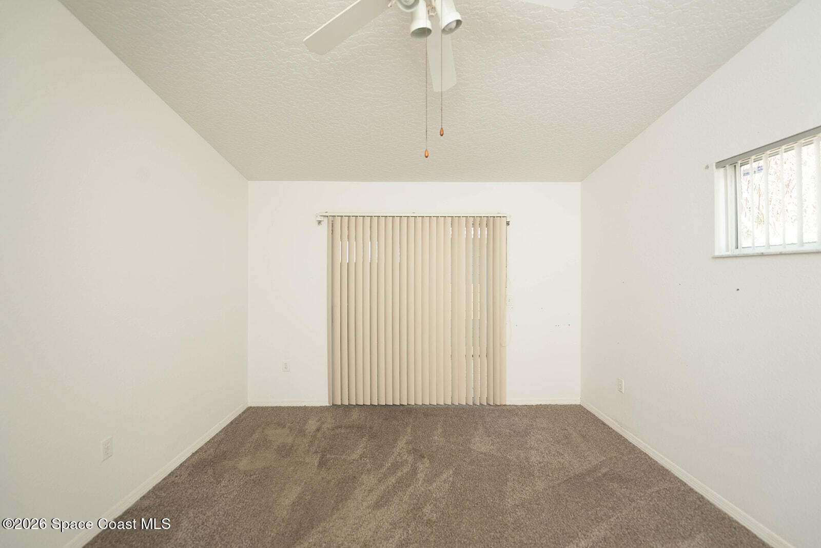 1954 Quail Ridge Court, Unit 1701 Cocoa, FL 32926 - Photo 16 of 41 an empty room with windows