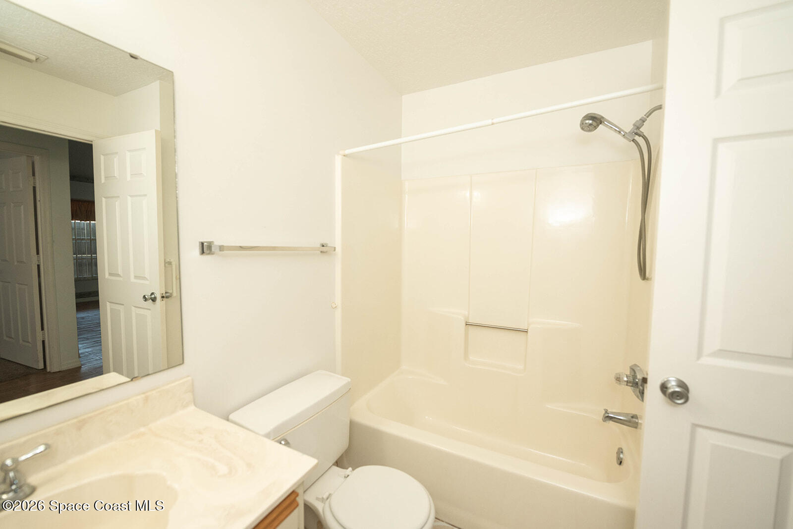 1954 Quail Ridge Court, Unit 1701 Cocoa, FL 32926 - Photo 21 of 41 a bathroom with a shower and a bath tub
