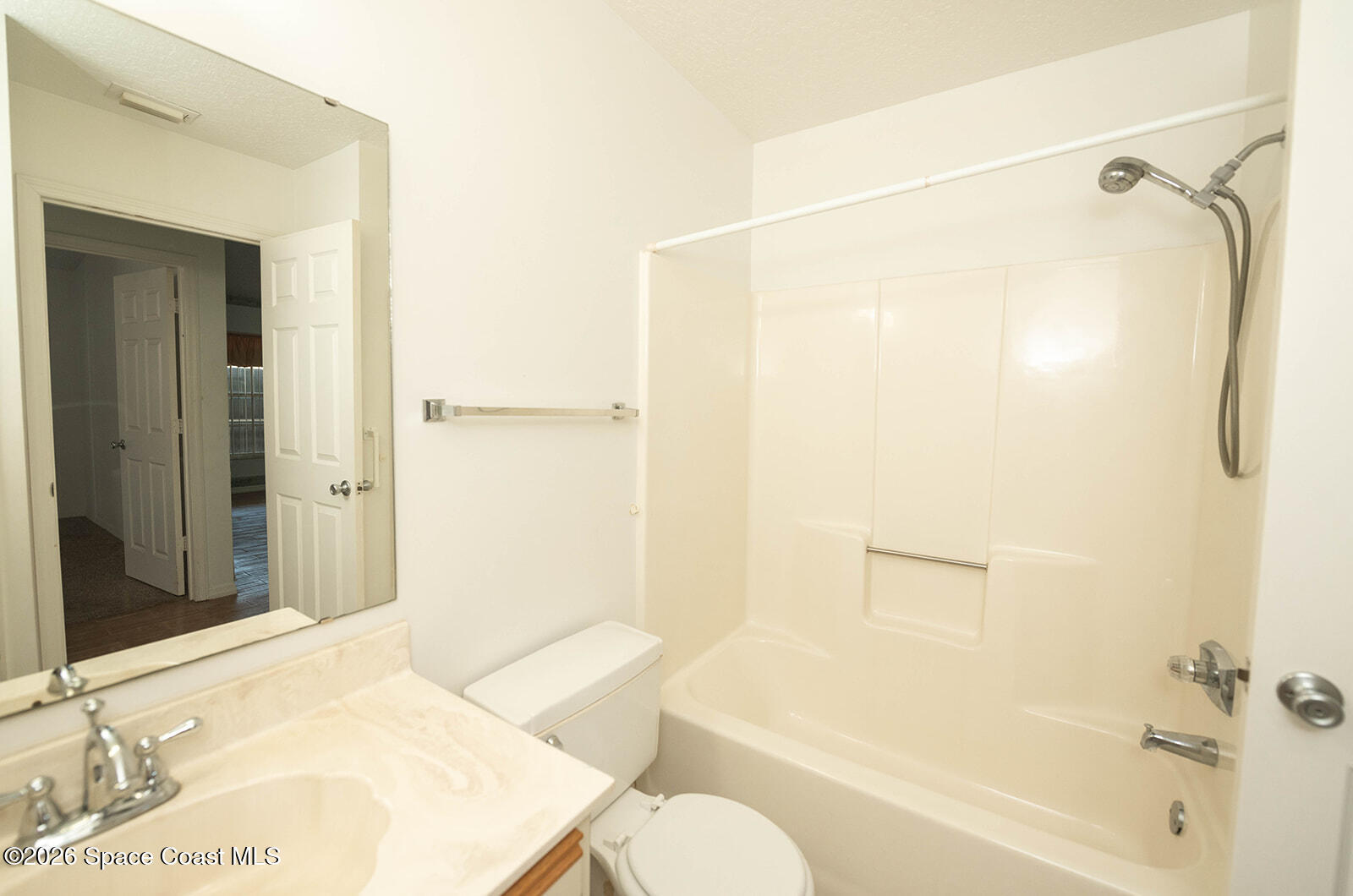 1954 Quail Ridge Court, Unit 1701 Cocoa, FL 32926 - Photo 22 of 41 a bathroom with a sink and shower