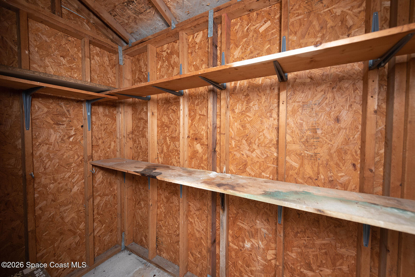 1954 Quail Ridge Court, Unit 1701 Cocoa, FL 32926 - Photo 8 of 41 a close view of wooden door