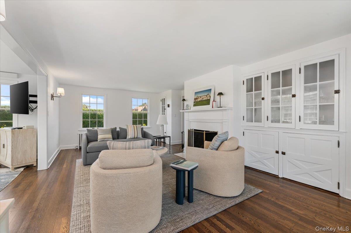 2 Strongs Lane Water Mill, NY 11976 - Photo 14 of 47 Living room featuring dark wood-style floors and a fireplace