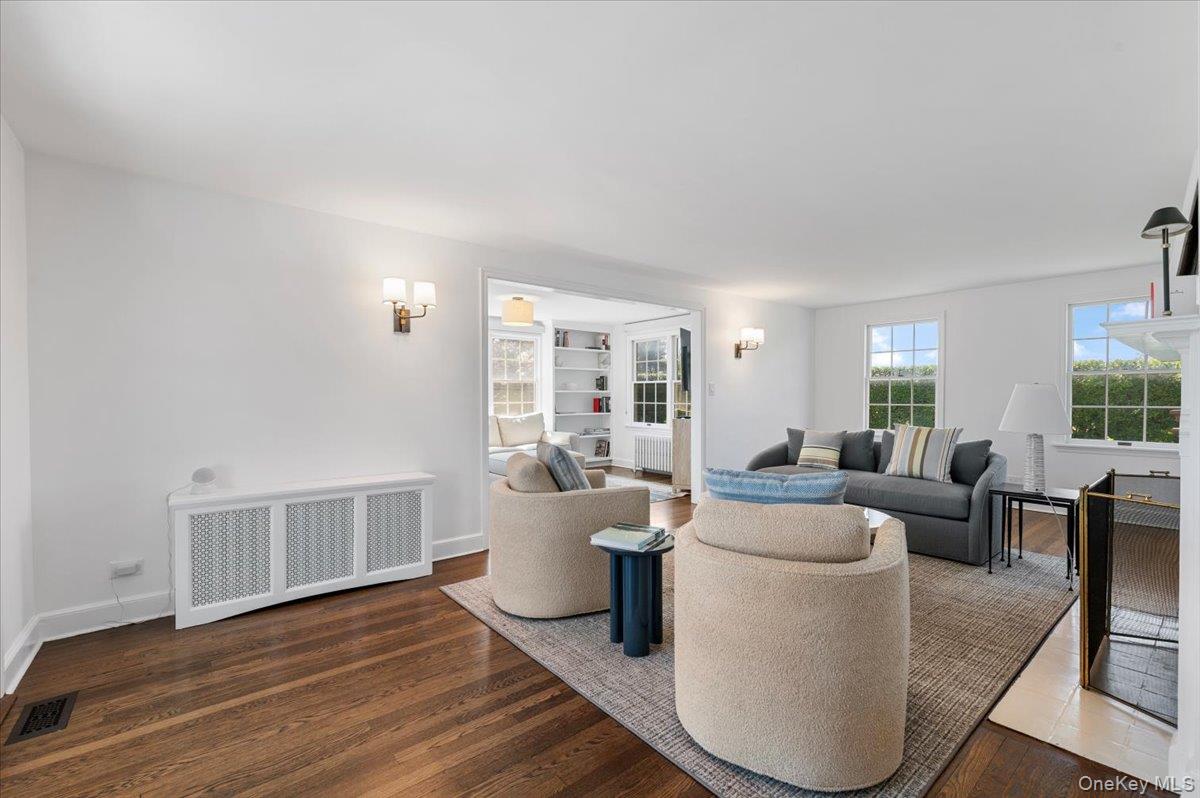 2 Strongs Lane Water Mill, NY 11976 - Photo 15 of 47 Living area with radiator and dark wood-type flooring