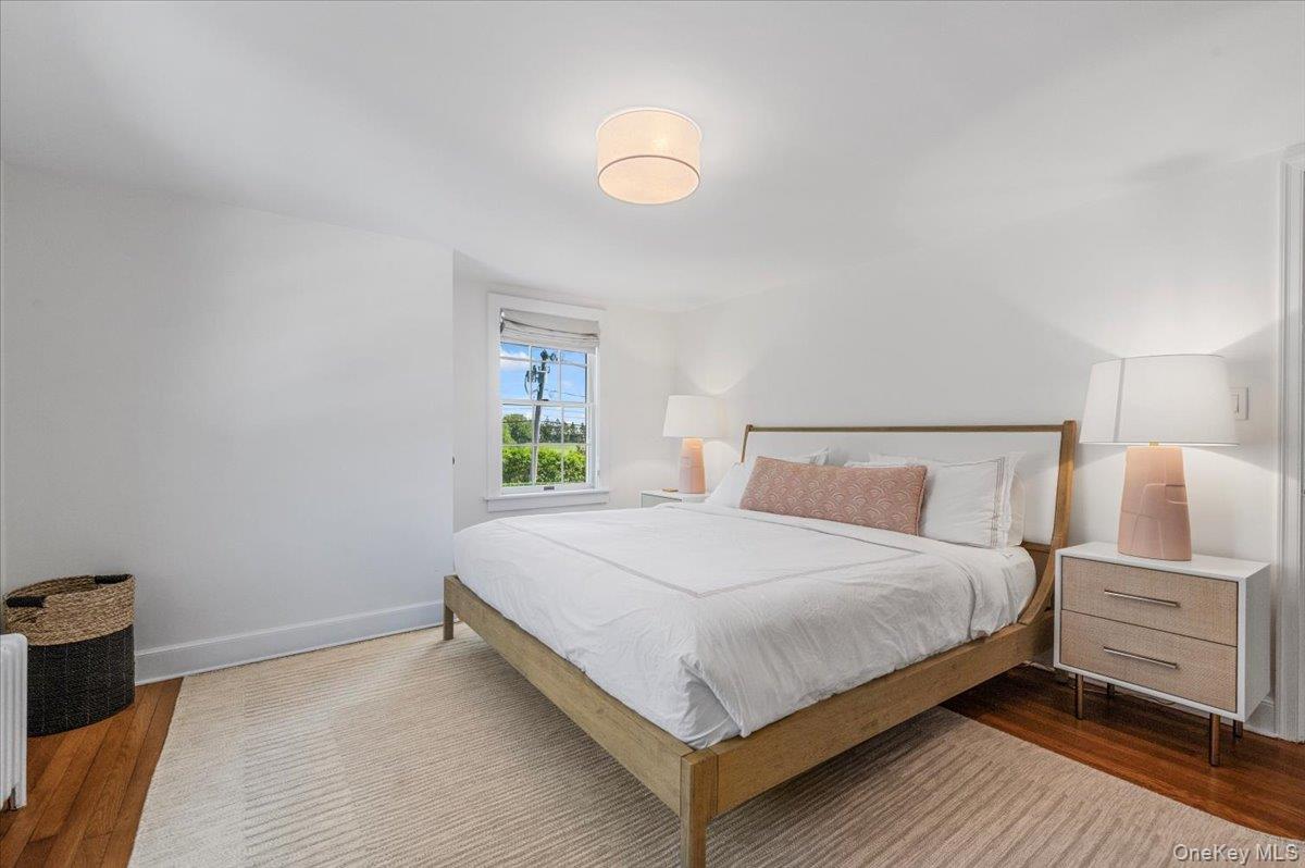 2 Strongs Lane Water Mill, NY 11976 - Photo 39 of 47 Bedroom with wood finished floors and baseboards