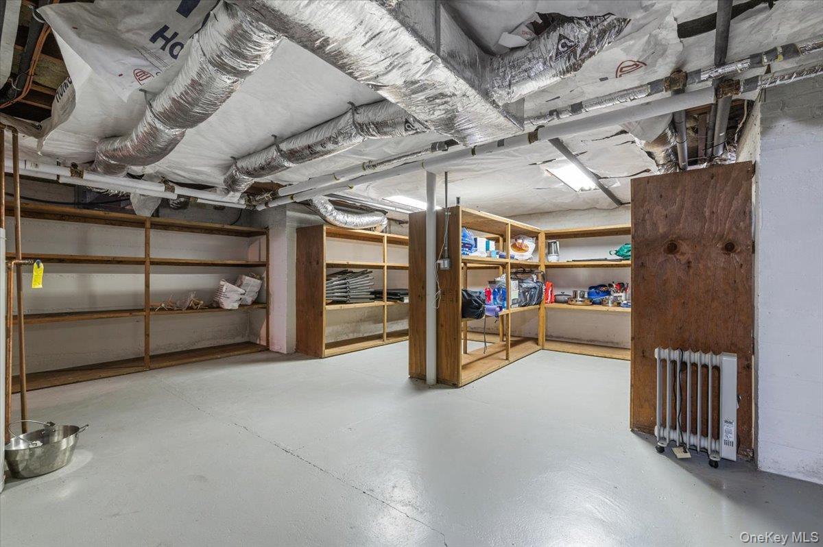 2 Strongs Lane Water Mill, NY 11976 - Photo 43 of 47 Unfinished below grade area featuring radiator