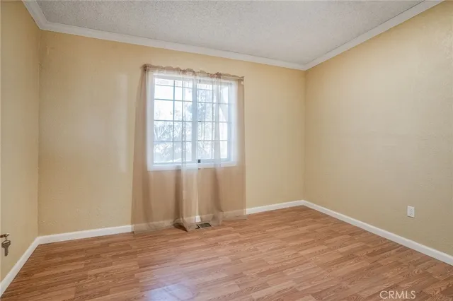 a bathroom with a sink a toilet a shower and a mirror
