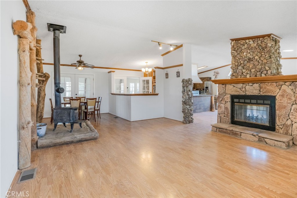 49750 3 Points Road Lancaster, CA 93536 - Photo 2 of 67 a view of a livingroom with furniture and a fireplace