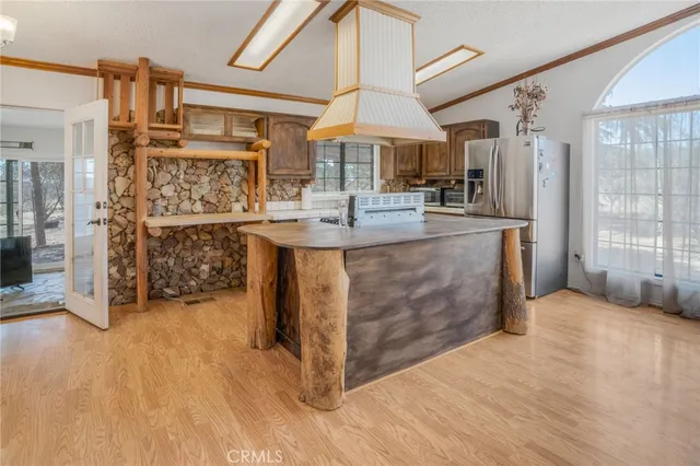 a bathroom with a tub shower and checkered floor