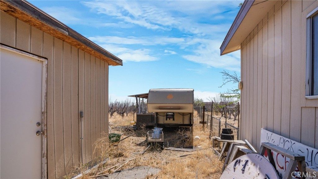 49750 3 Points Road Lancaster, CA 93536 - Photo 44 of 67 a backyard of a house with outdoor seating