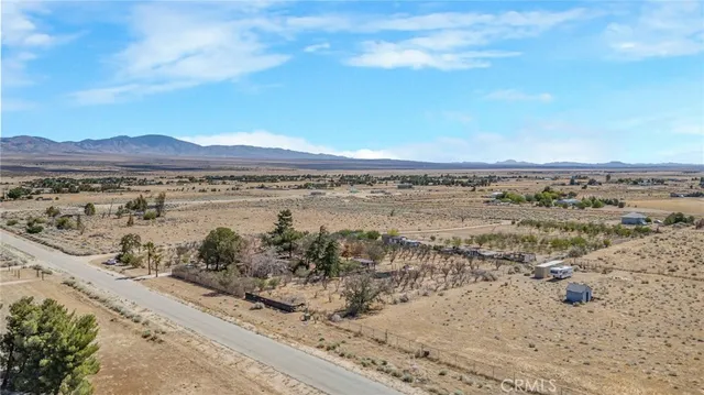 a view of pathway with a yard