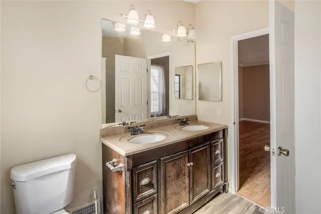 a bathroom with a sink and a toilet