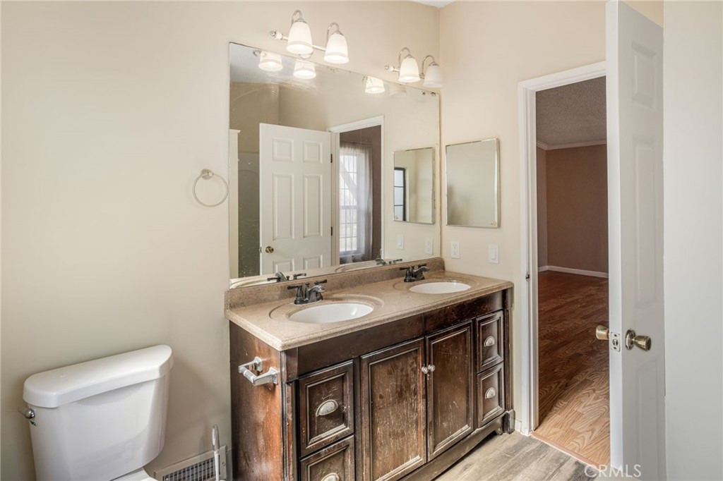 49750 3 Points Road Lancaster, CA 93536 - Photo 6 of 67 a bathroom with a sink and a toilet