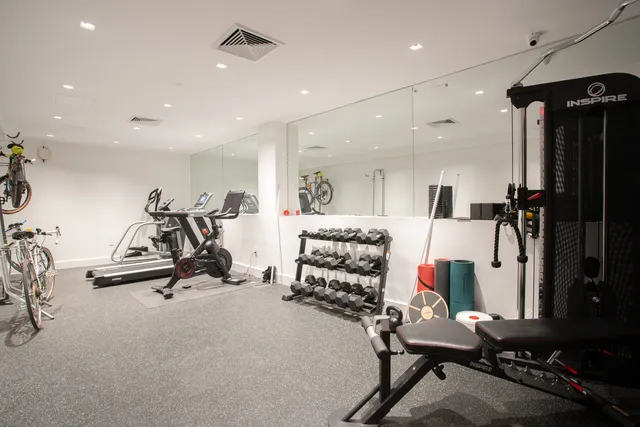 a terrace with outdoor seating and city view