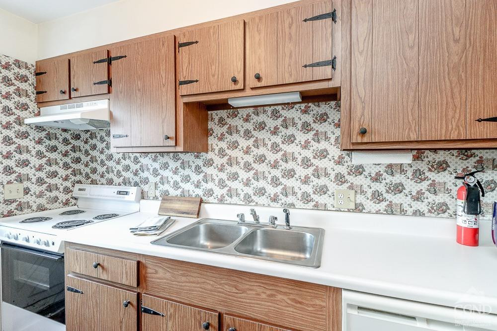 167 Highway 23 Claverack, NY 12513 - Photo 13 of 23 a kitchen with stainless steel appliances granite countertop a sink and a microwave