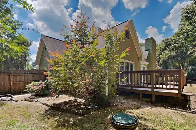 a house view with a garden space