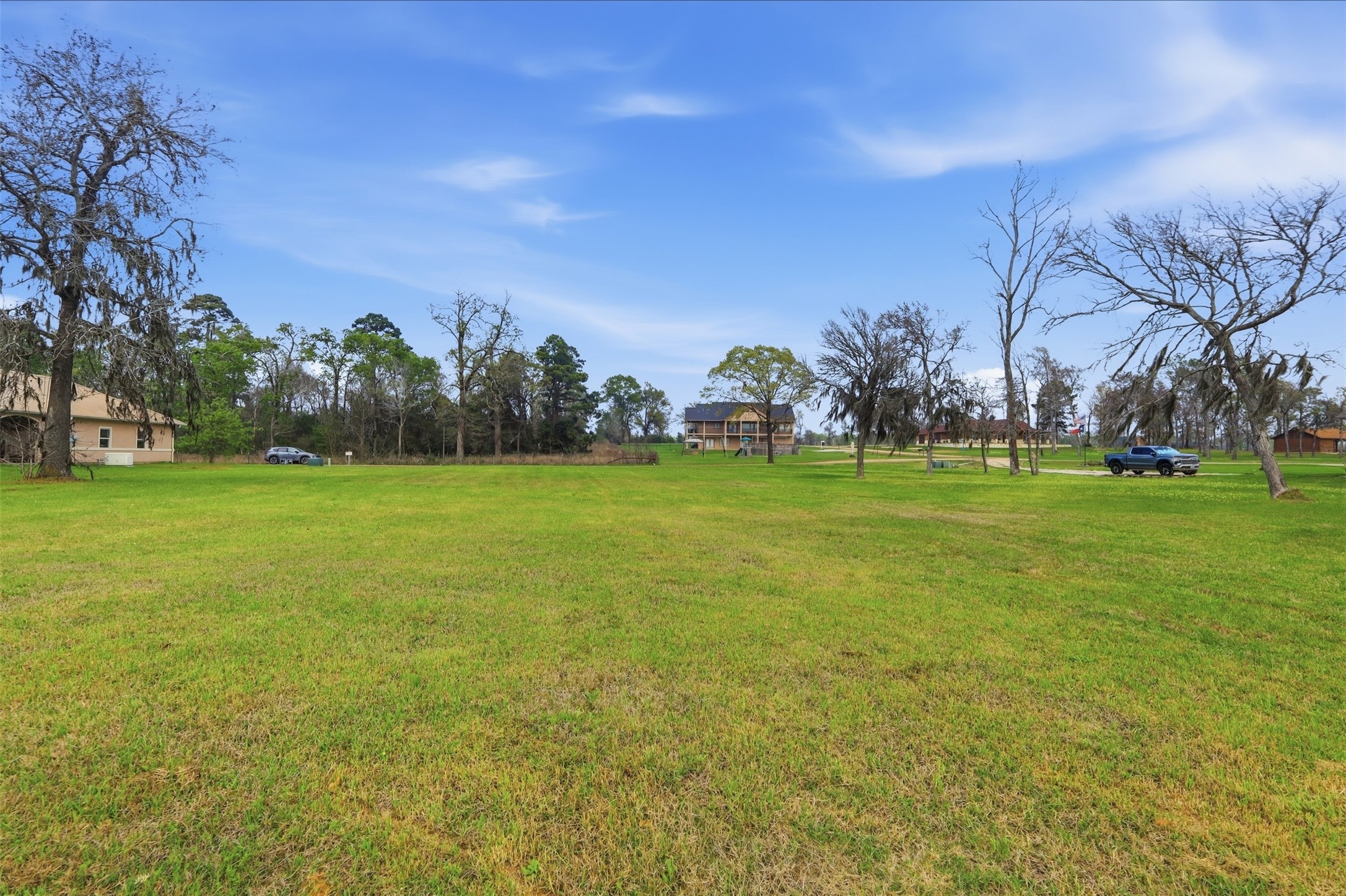Lot 89 Bridgewater Onalaska, TX 77360 - Photo 12 of 15 a view of a field with trees
