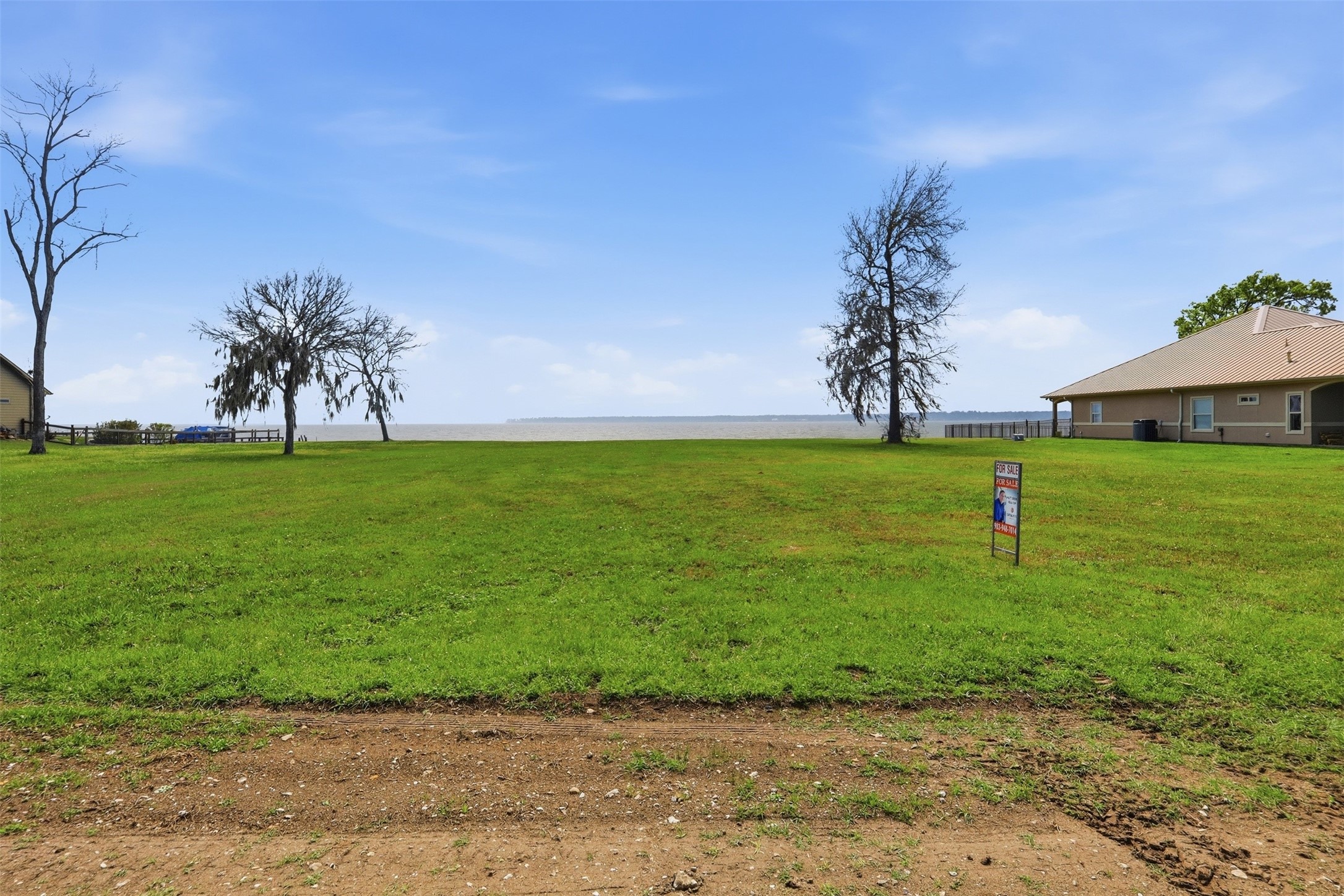 Lot 89 Bridgewater Onalaska, TX 77360 - Photo 10 of 15 a backyard of a house with lots of green space