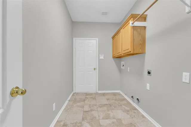 a view of bathroom with a window