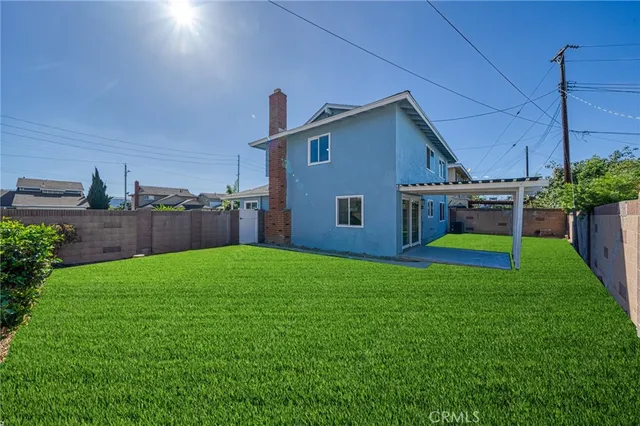 a house view with a garden space