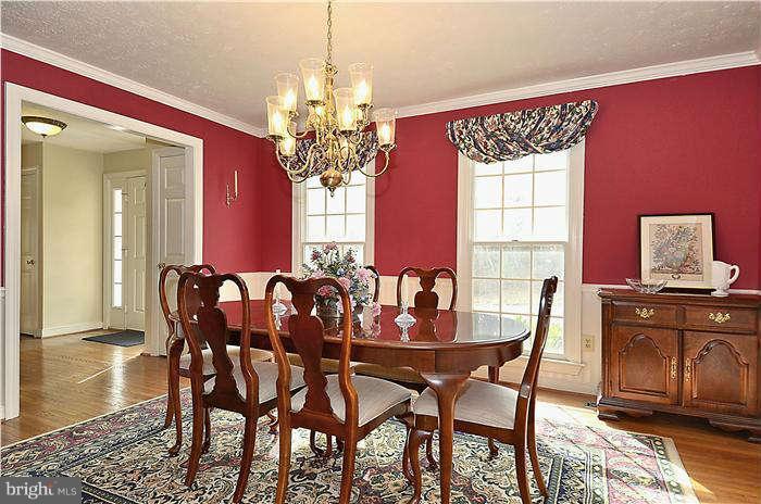 10378 Stansfield Road Laurel, MD 20723 - Photo 11 of 30 Crown molding and wainscotting adorn rooms