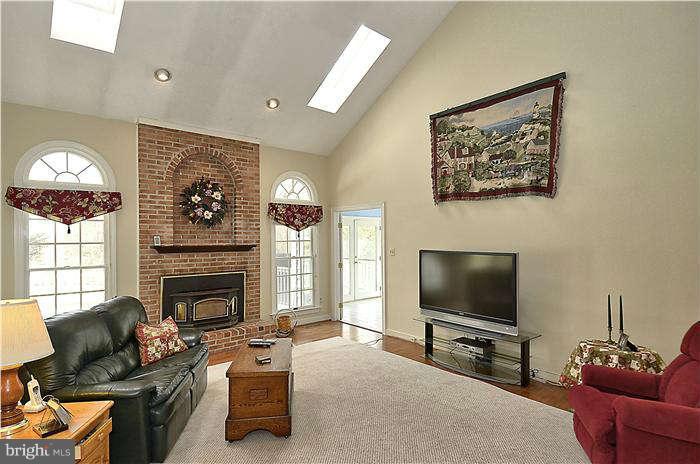 10378 Stansfield Road Laurel, MD 20723 - Photo 5 of 30 Family room w/ full brick fireplace