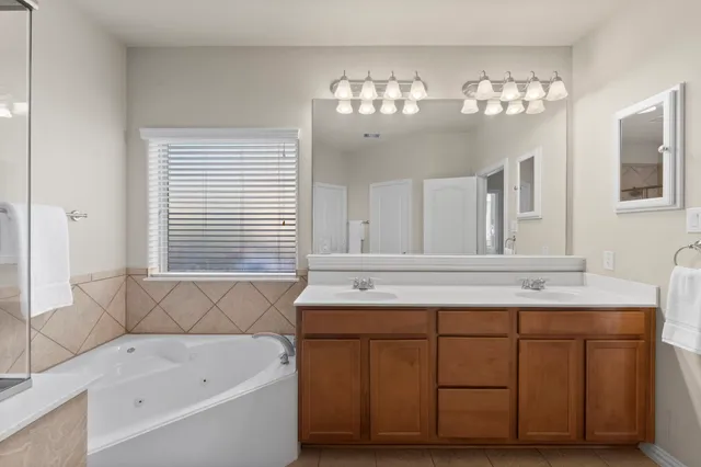 a bathroom with a sink and a bathtub