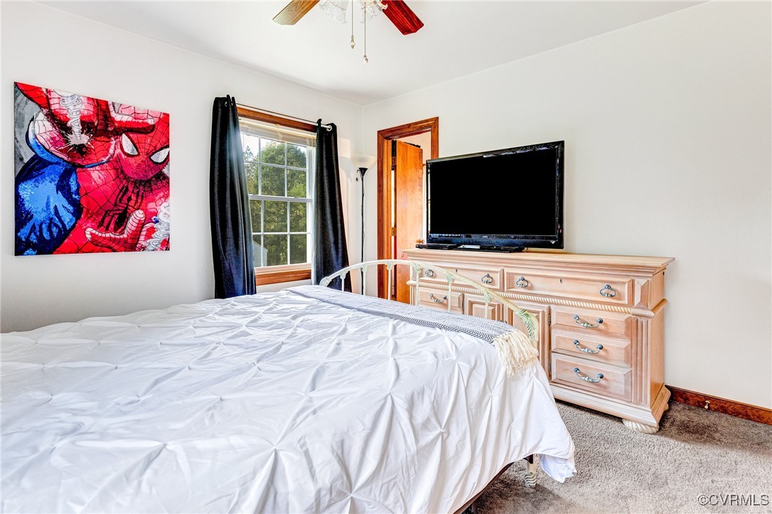 3050 Rose Mount Road Walkerton, VA 23177 - Photo 11 of 35 Bedroom with carpet and ceiling fan