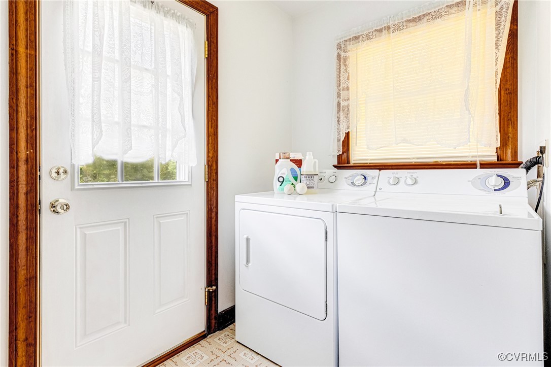 3050 Rose Mount Road Walkerton, VA 23177 - Photo 21 of 35 Clothes washing area with washer and dryer