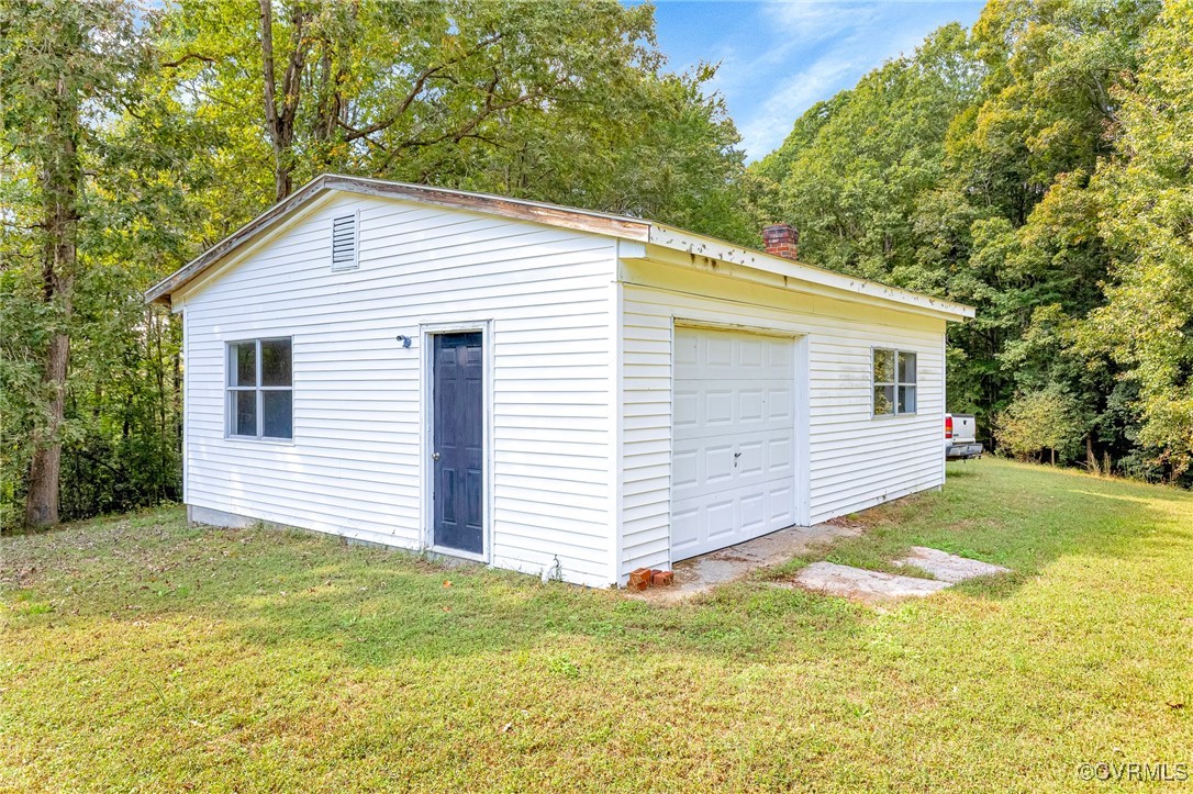3050 Rose Mount Road Walkerton, VA 23177 - Photo 29 of 35 Garage with a yard