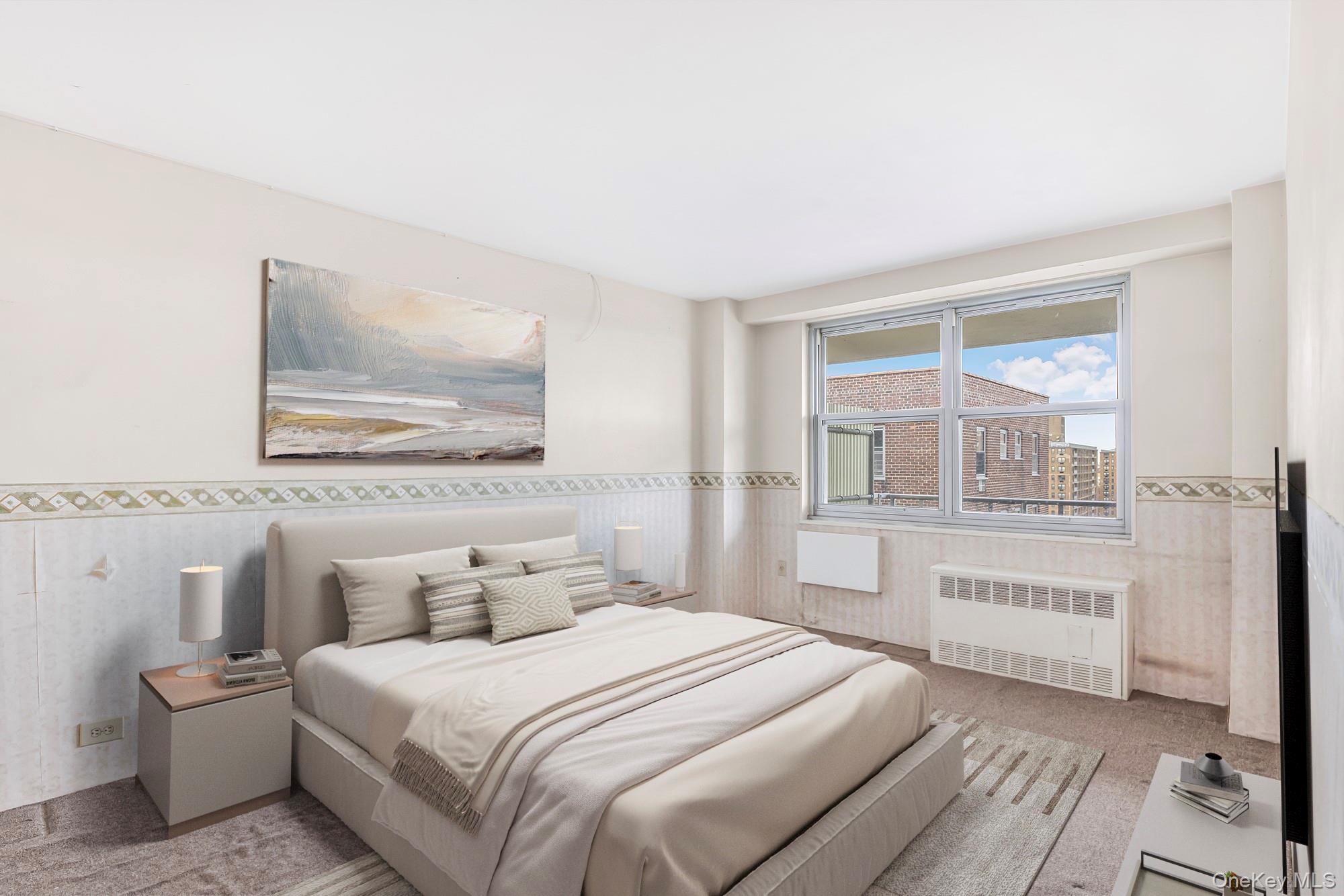 61-25 97th Street, Unit 15F Queens, NY 11374 - Photo 14 of 26 a bedroom with a bed and a large window