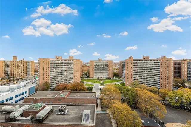 a view of a city with tall buildings