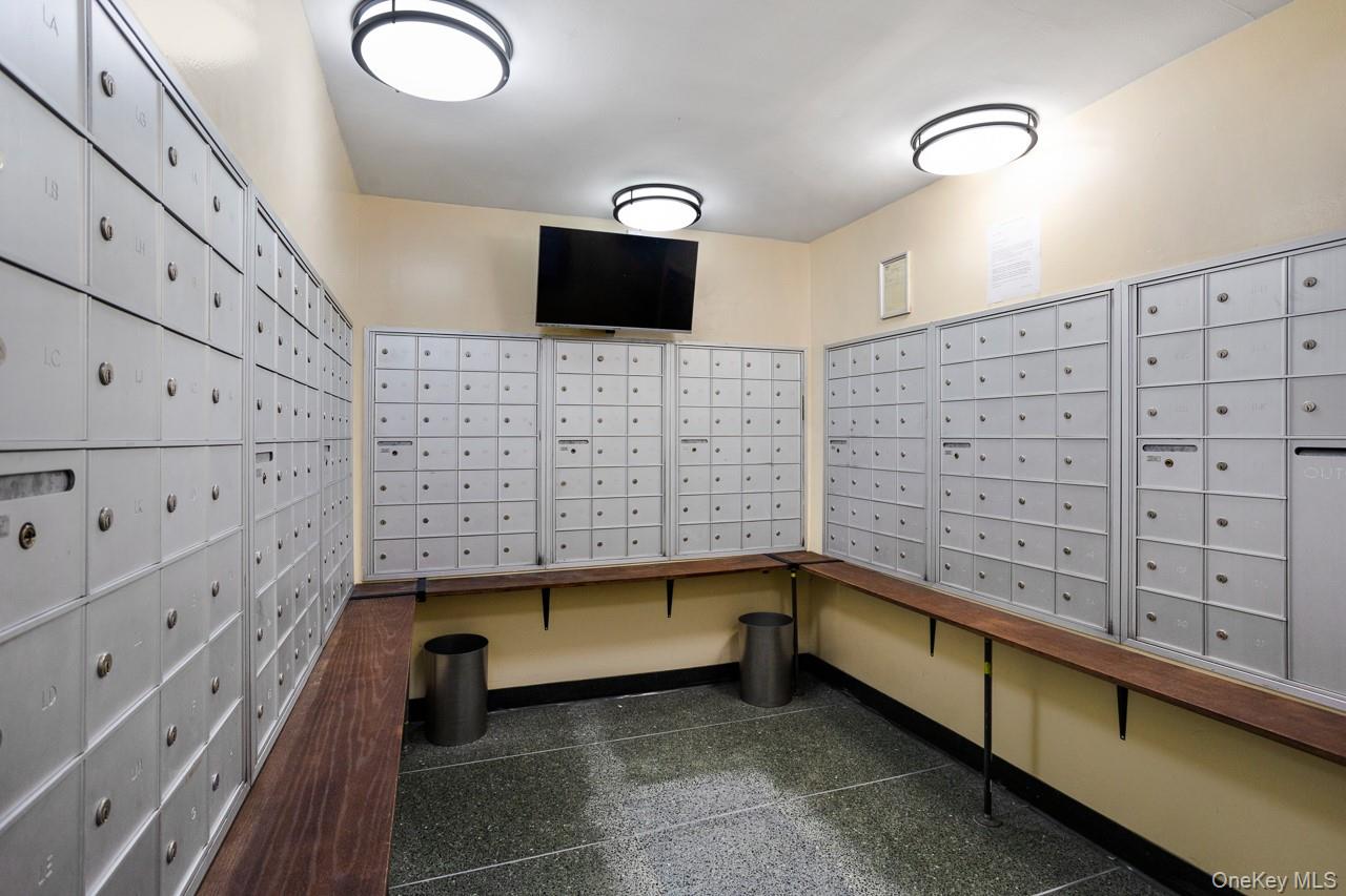 61-25 97th Street, Unit 15F Queens, NY 11374 - Photo 6 of 26 a bathroom with a sink and a bathtub