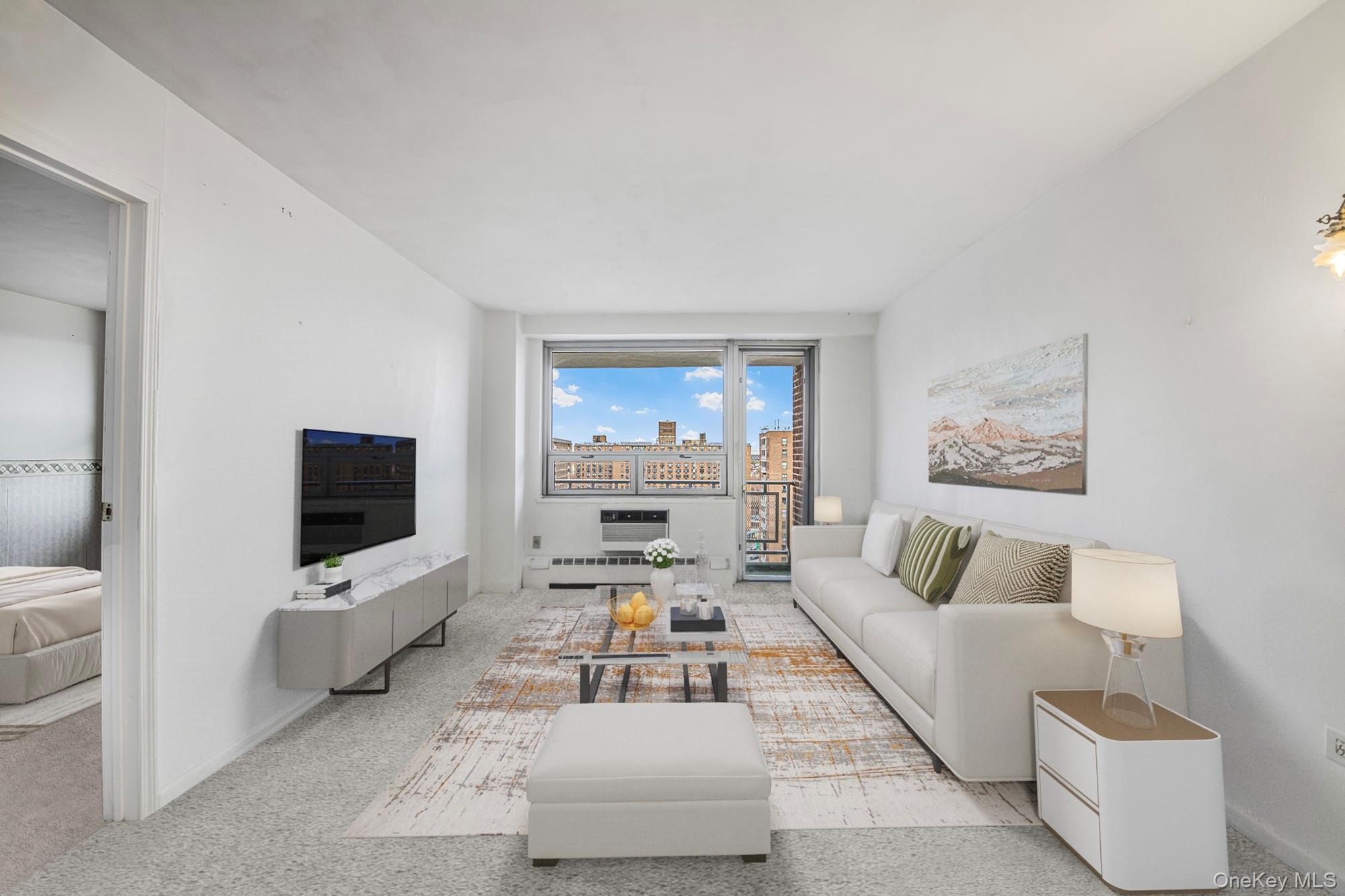 61-25 97th Street, Unit 15F Queens, NY 11374 - Photo 7 of 26 a living room with furniture and a flat screen tv