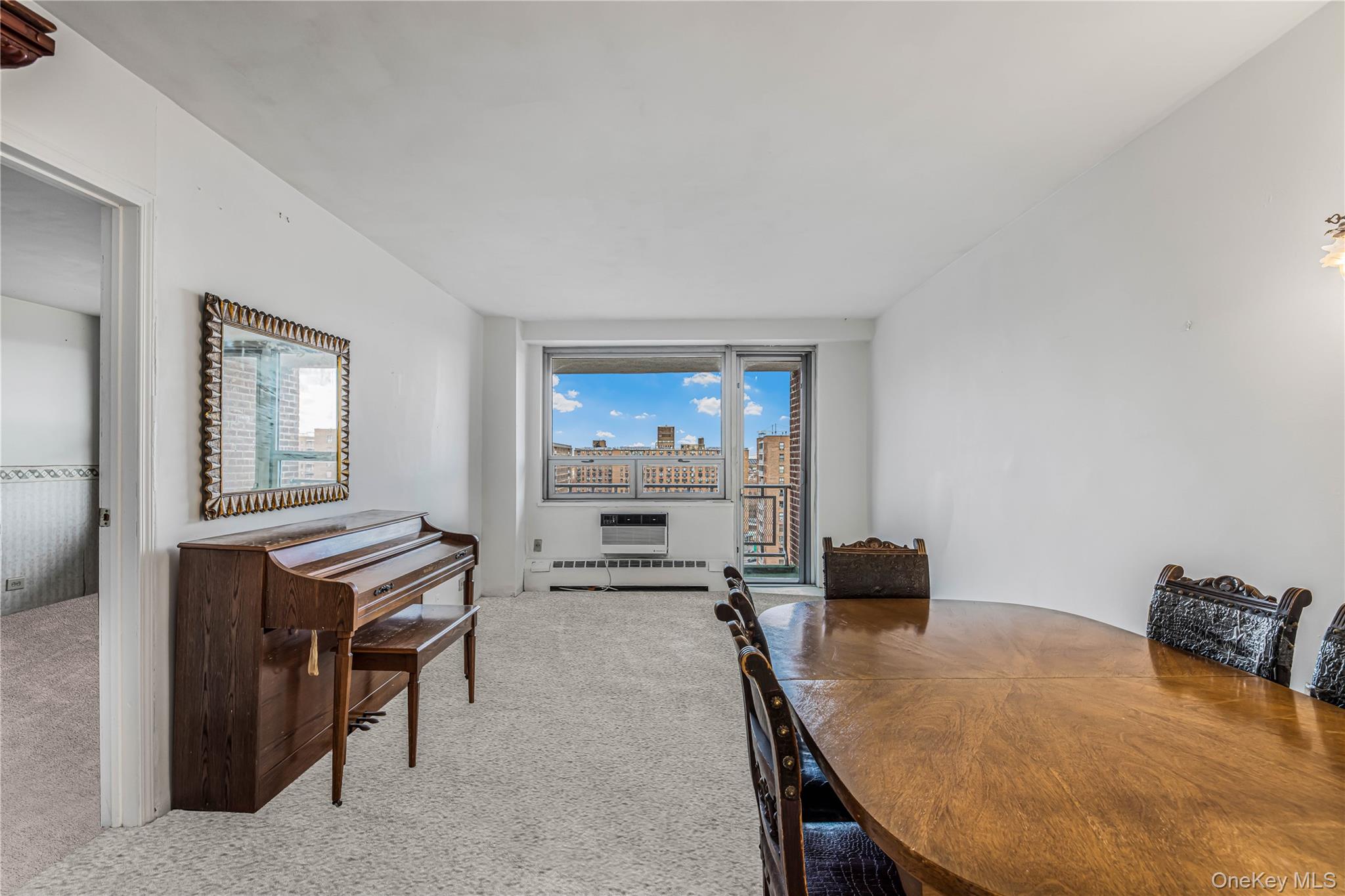 61-25 97th Street, Unit 15F Queens, NY 11374 - Photo 9 of 26 a view of a livingroom with furniture