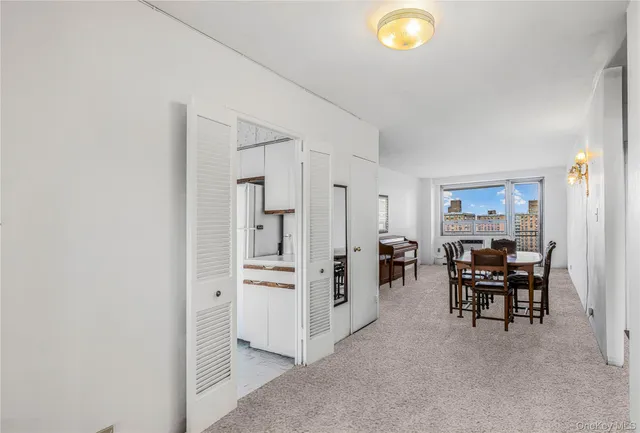 a view of kitchen with furniture and counter top space