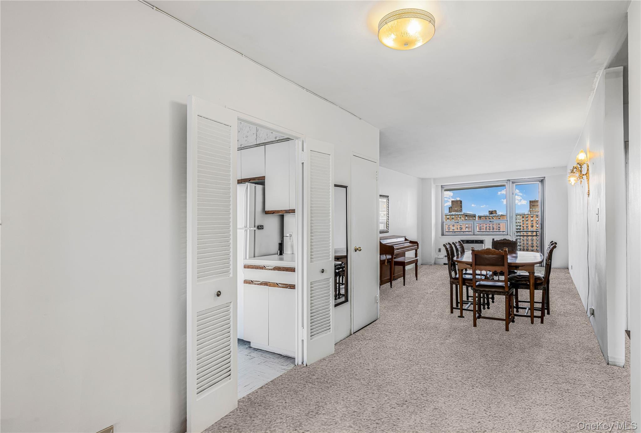 61-25 97th Street, Unit 15F Queens, NY 11374 - Photo 10 of 26 a view of kitchen with furniture and counter top space