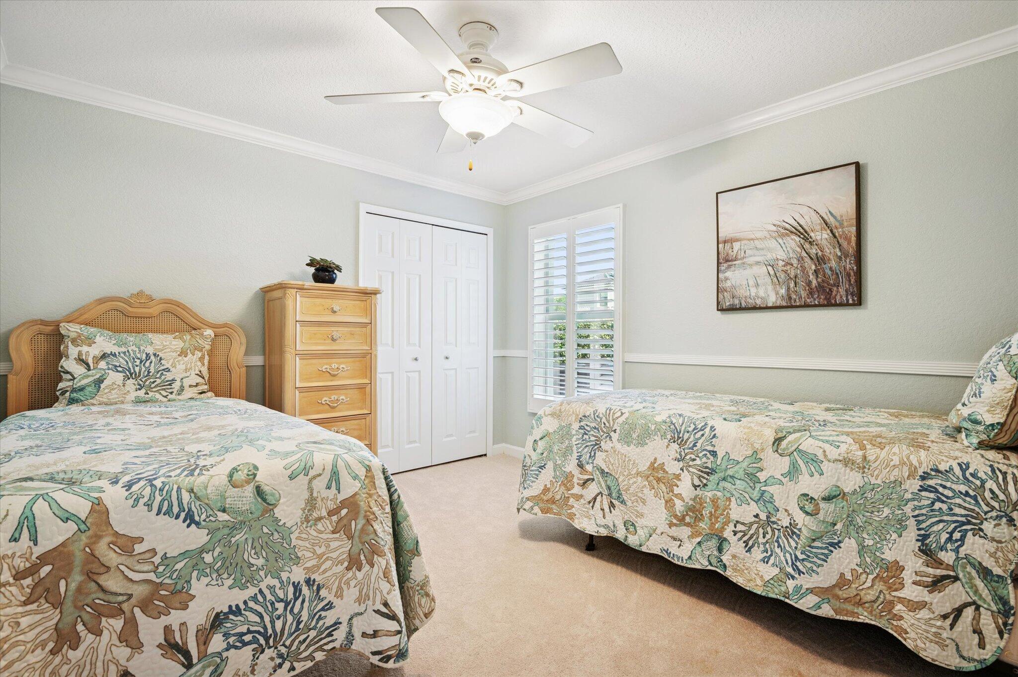 7299 Serrano Terrace Delray Beach, FL 33446 - Photo 18 of 39 a bedroom with a bed and a painting on the wall