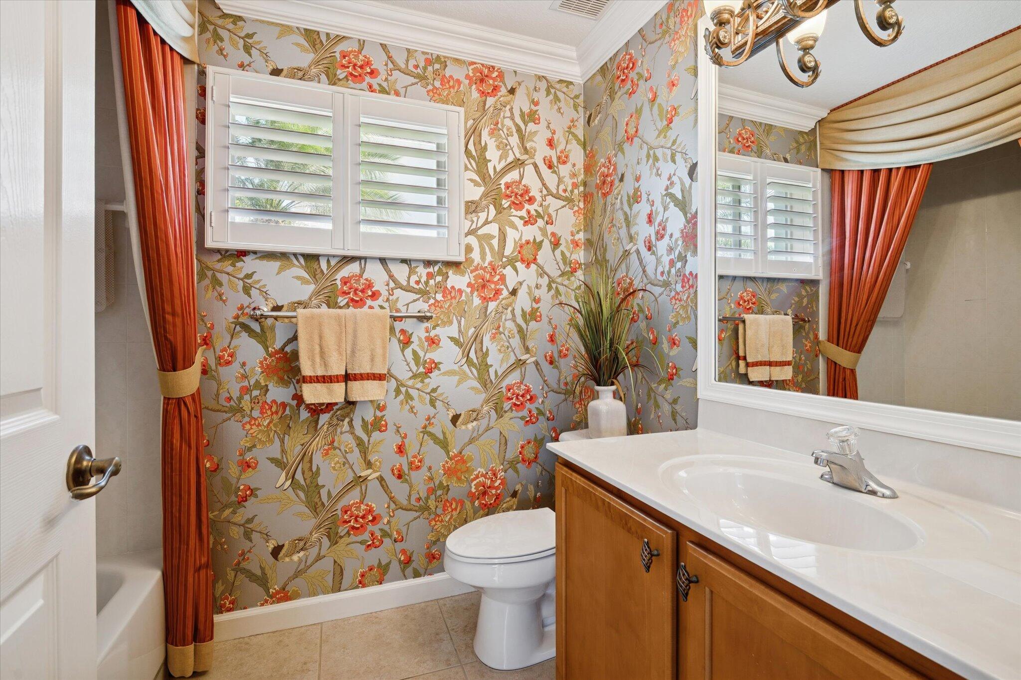 7299 Serrano Terrace Delray Beach, FL 33446 - Photo 21 of 39 a bathroom with a sink and a toilet