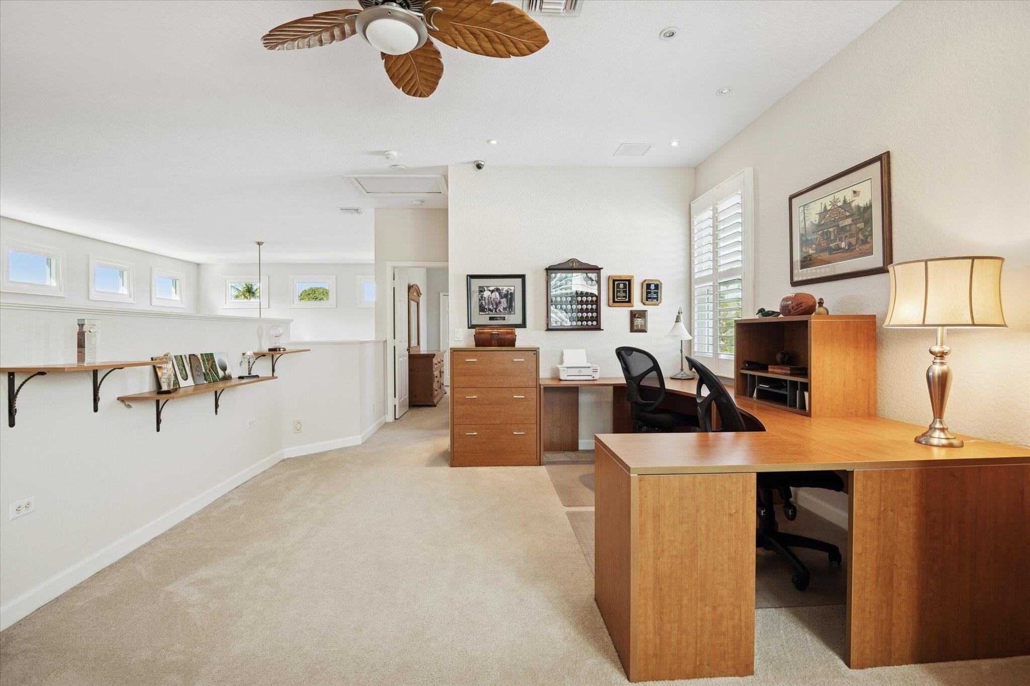 7299 Serrano Terrace Delray Beach, FL 33446 - Photo 24 of 39 a view of a workspace with furniture