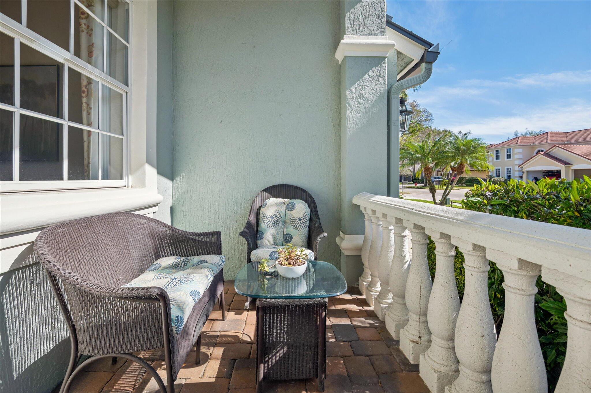 7299 Serrano Terrace Delray Beach, FL 33446 - Photo 5 of 39 a view of a balcony with furniture