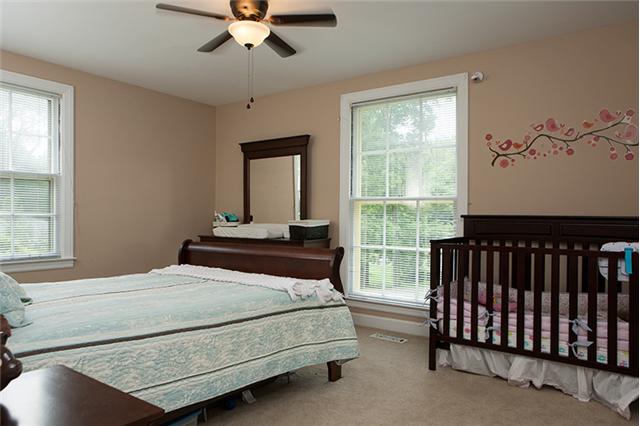 604 Hogan Road Nashville, TN 37220 - Photo 14 of 20 Bedrooms feature ceiling fans and carpet -- original hardwoods can be found underneath.