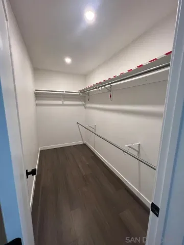 a view of a room with racks on the wall