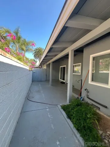 a house view with a garden space